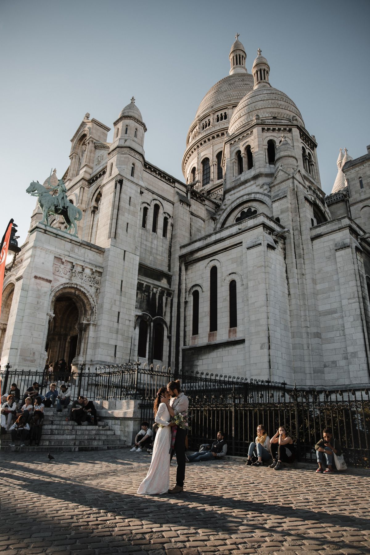 Bride and groom near Sacré-Cœur during their Paris elopement photoshoot