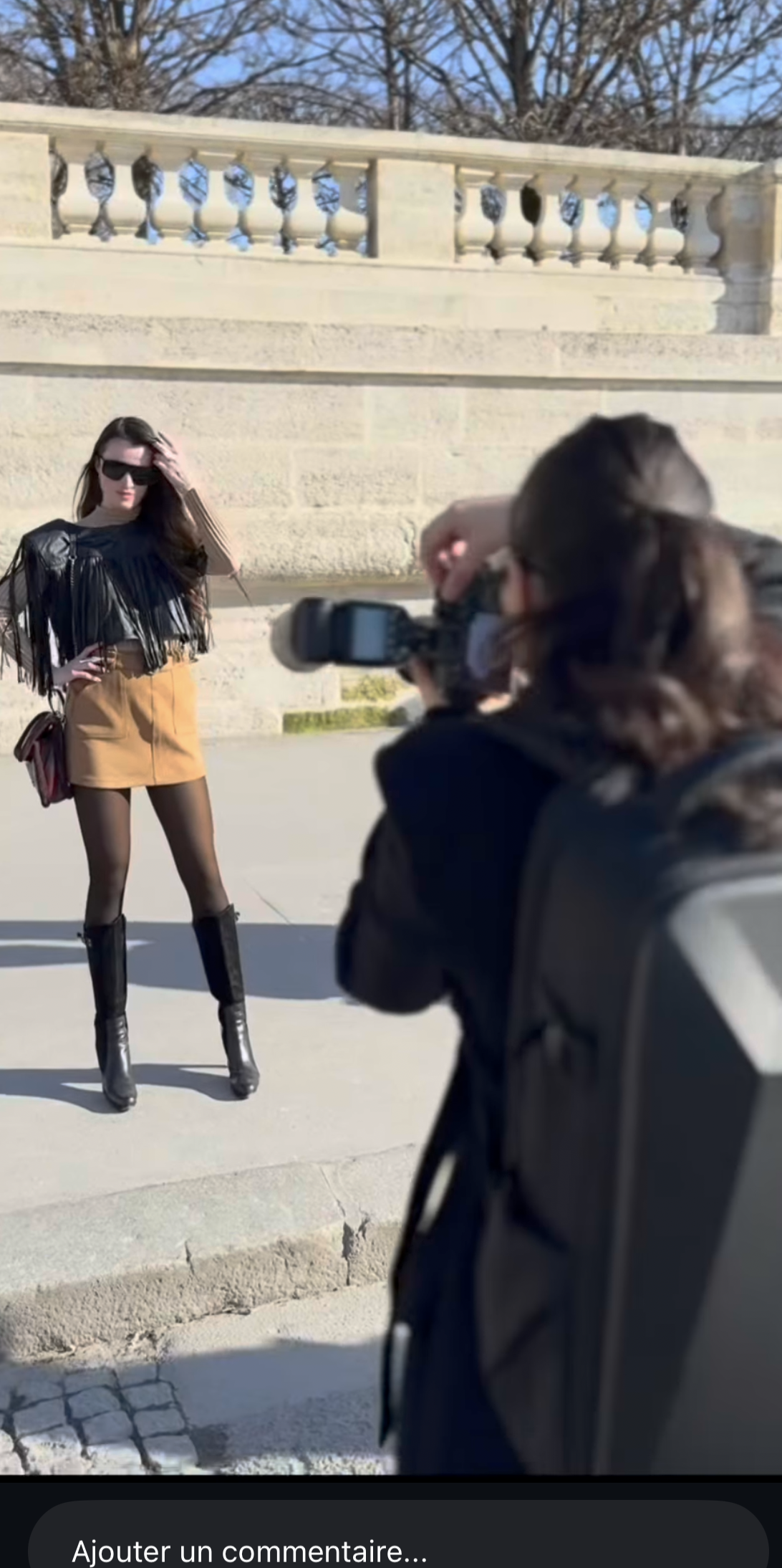 Behind-the-scenes moment from a fashion photoshoot in Paris during Fashion Week