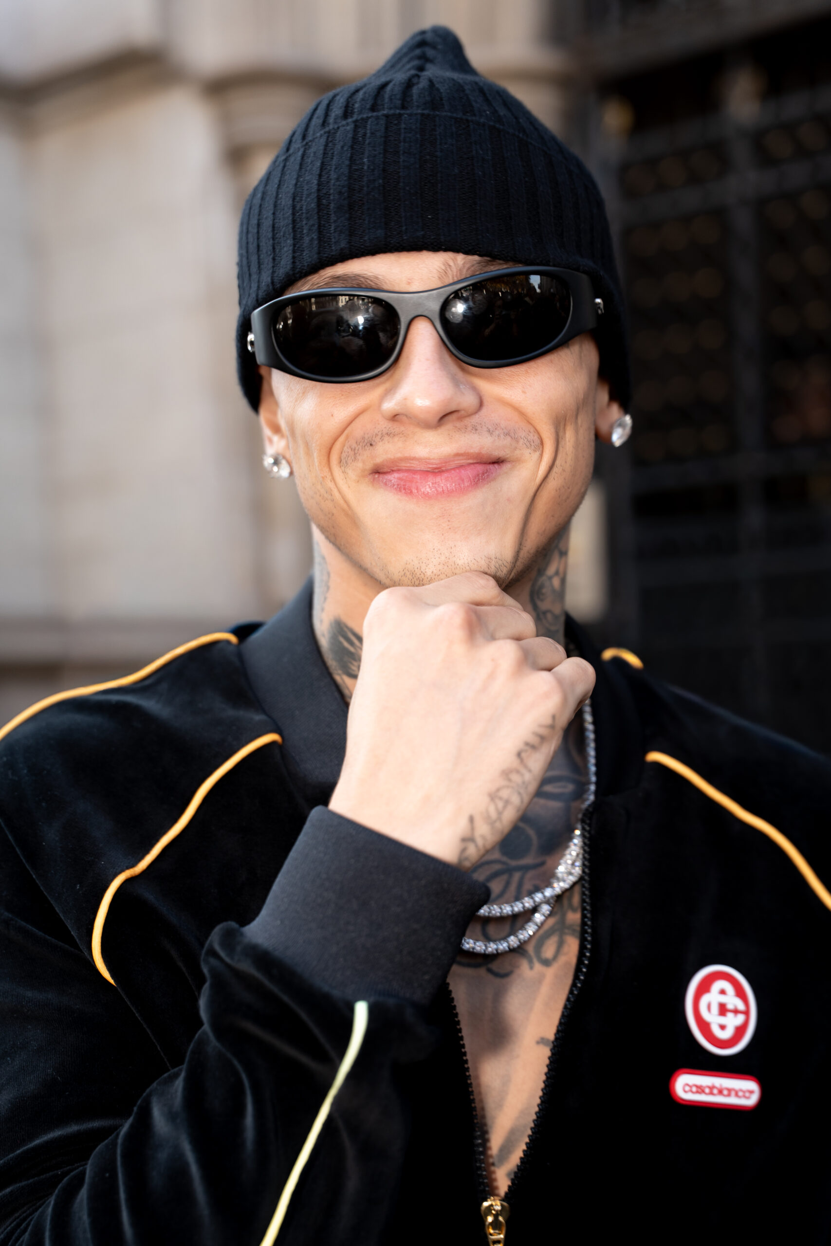 Close-up portrait of a centralcee wearing sunglasses during Paris Fashion Week