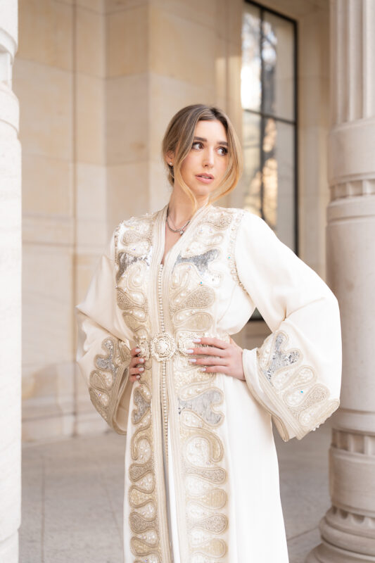 Close-up detail of an embroidered caftan during an editorial shoot in Paris