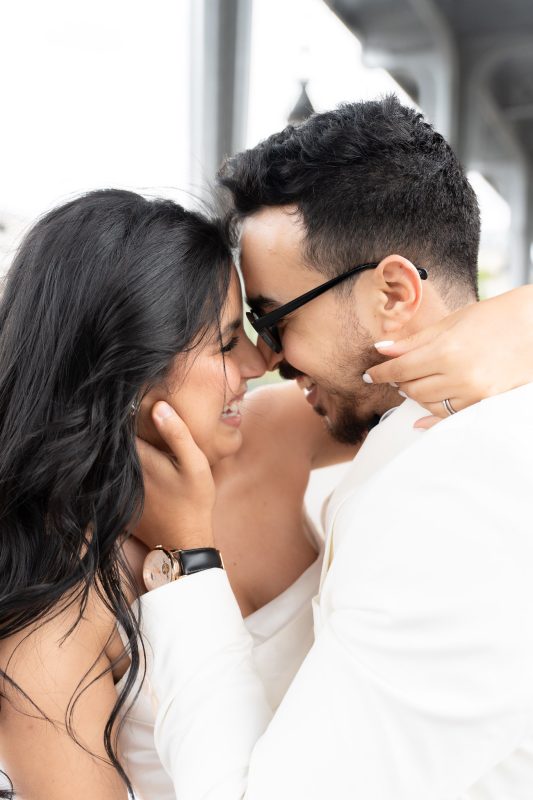 Close romantic portrait of bride and groom during their Paris wedding photoshoot at Bir-Hakeim