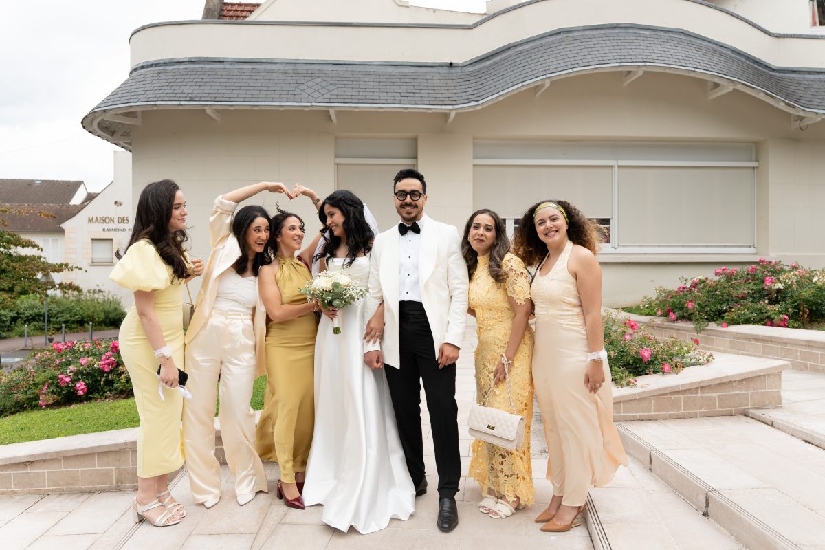 Bride and groom with bridesmaids after their civil wedding at L’Haÿ-les-Roses City Hall