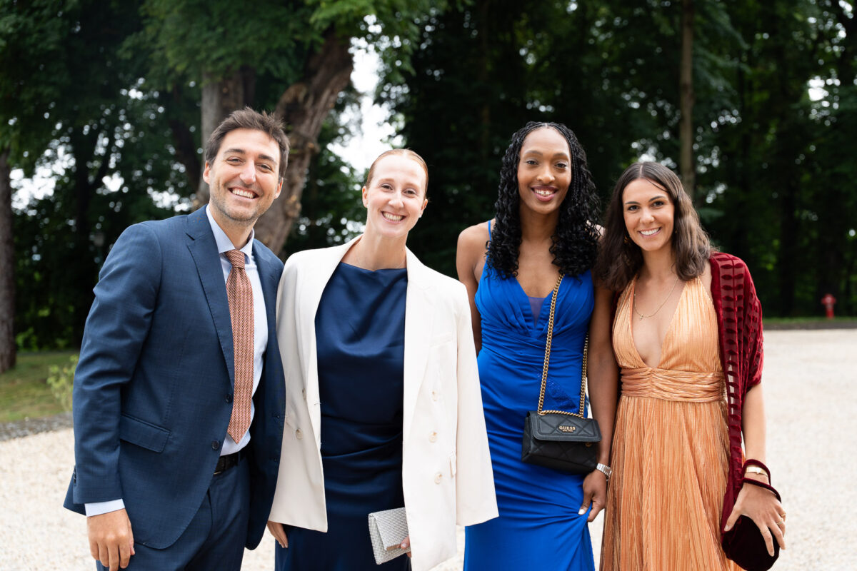 Wedding guests posing outdoors during a luxury wedding in Île-de-France