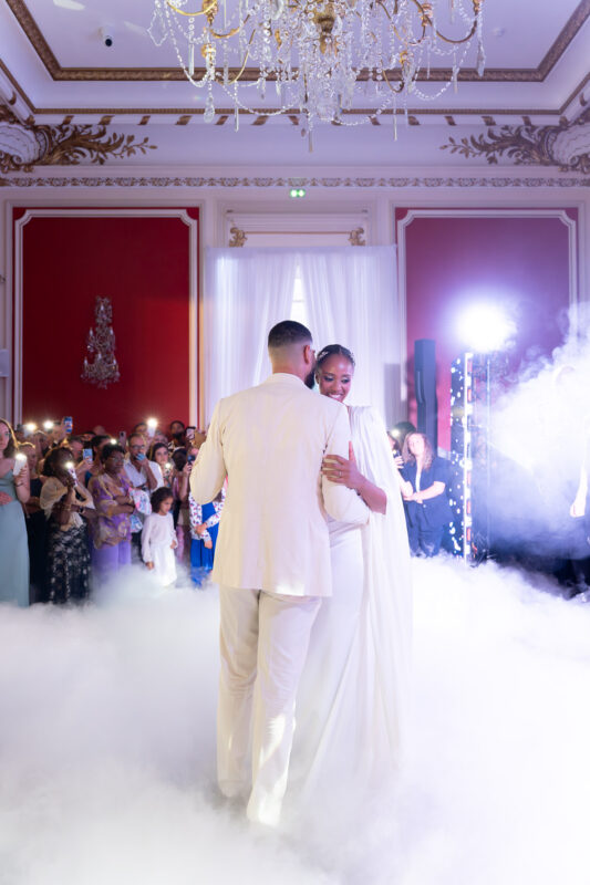 Bride and groom entering their luxury wedding reception with smoke effects