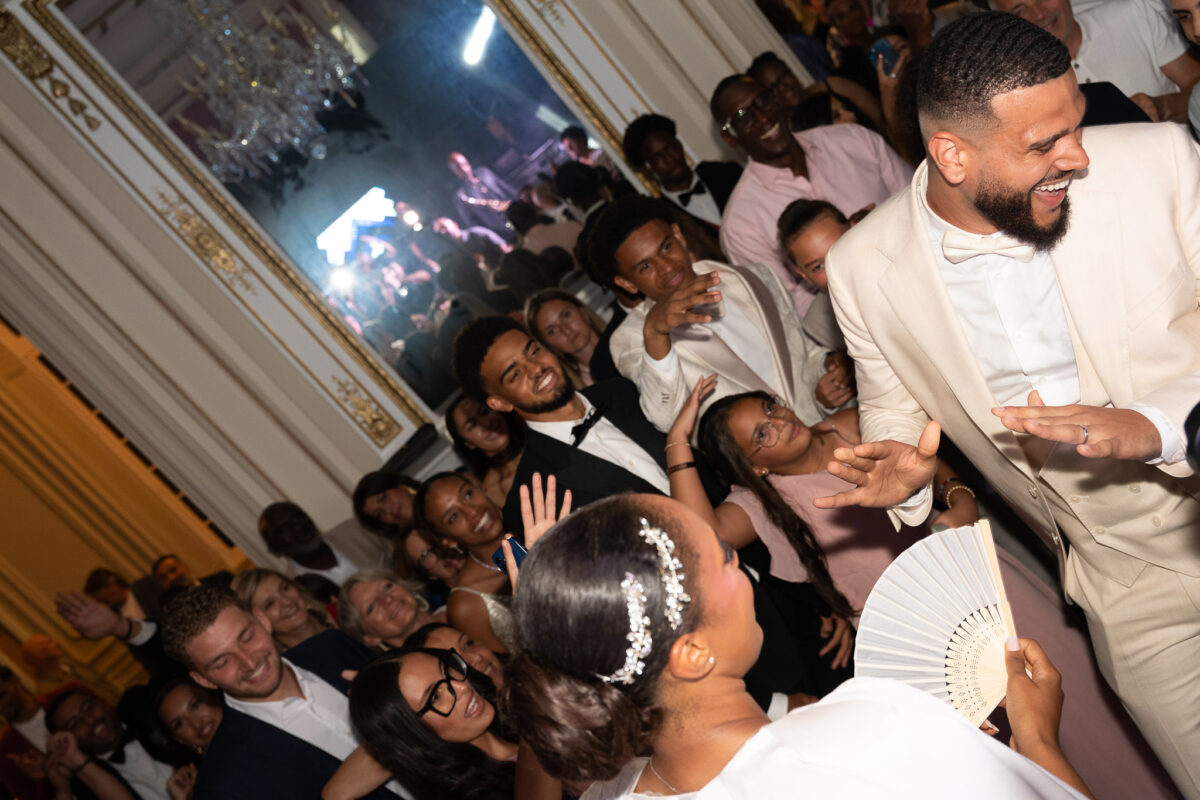 Wedding guests dancing during a luxury reception at Château de Saint-Martin-du-Tertre