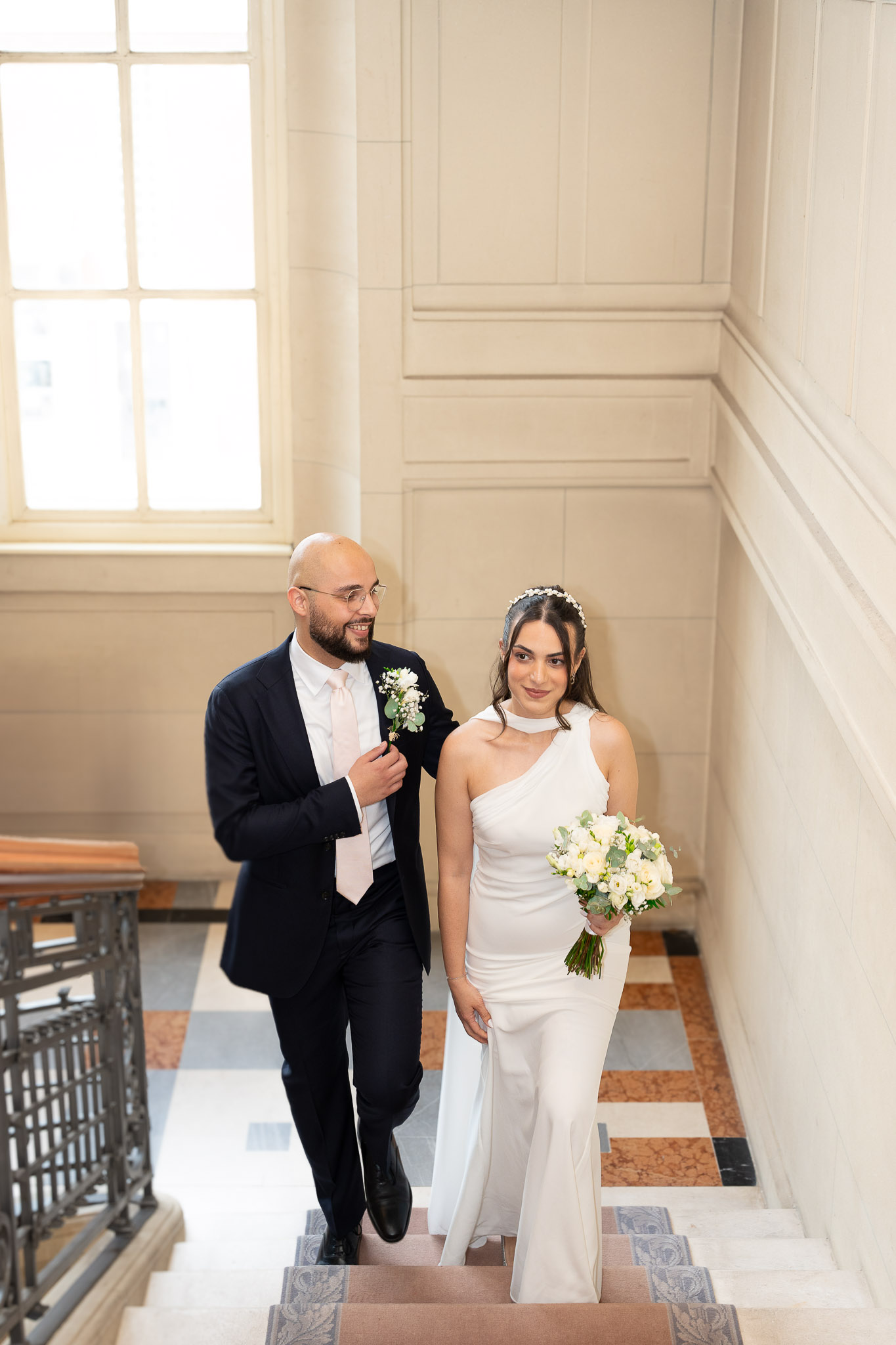 Bride and groom inside Suresnes City Hall during their civil wedding in Île-de-France
