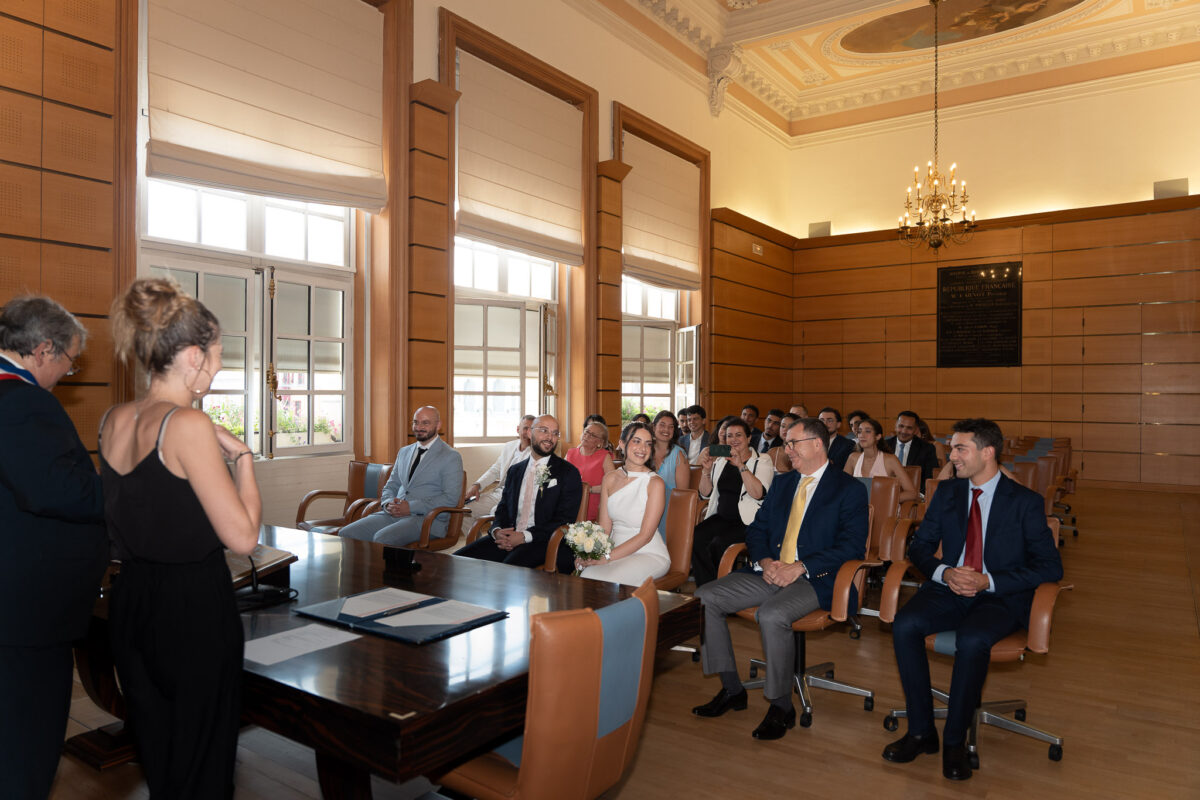 Guests attending a civil wedding ceremony at Suresnes City Hall